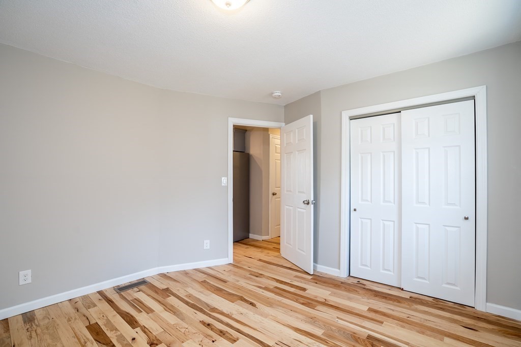 87 McBride Road Wales, MA 01081 - Photo 17 of 36 a view of a room with wooden floor