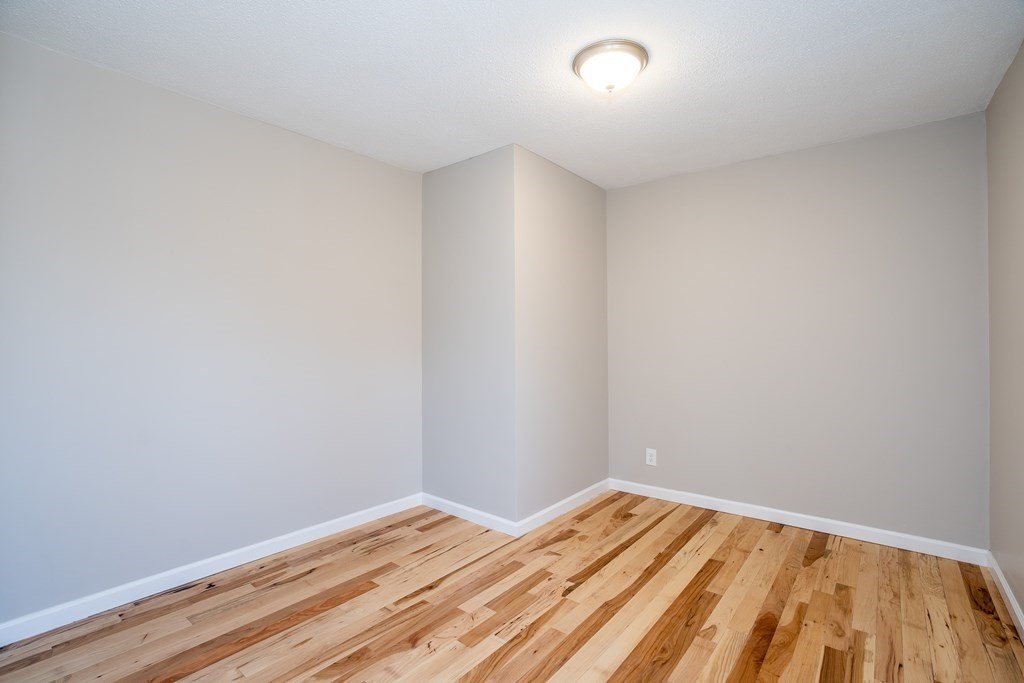 87 McBride Road Wales, MA 01081 - Photo 18 of 36 a view of a room with wooden floor