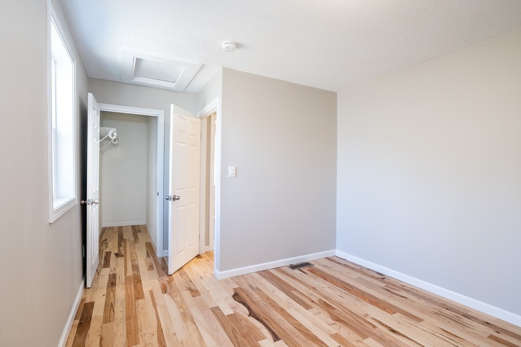 87 McBride Road Wales, MA 01081 - Photo 19 of 36 a view of a room with wooden floor and a bathroom