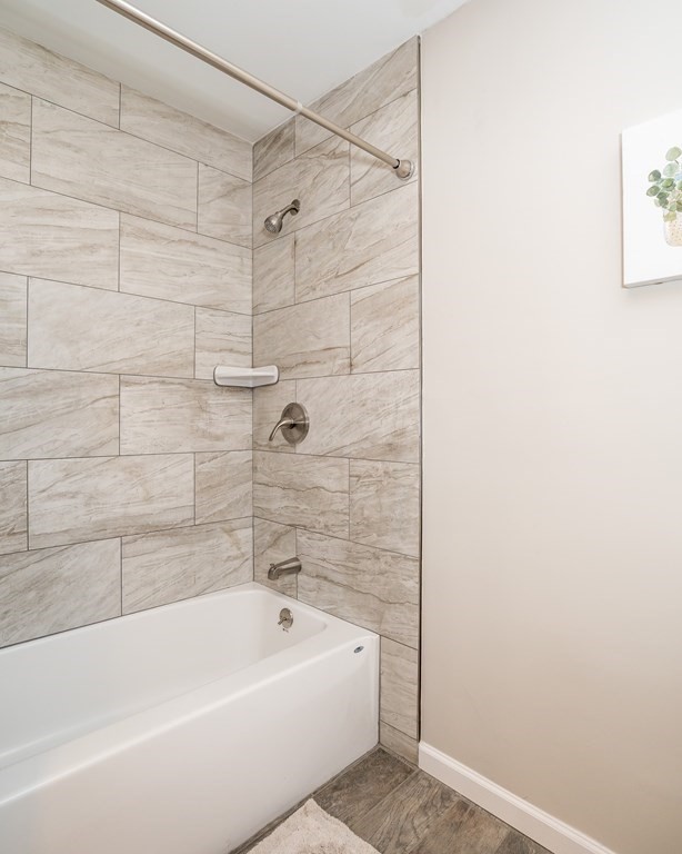 87 McBride Road Wales, MA 01081 - Photo 24 of 36 a bathroom with a bathtub and shower