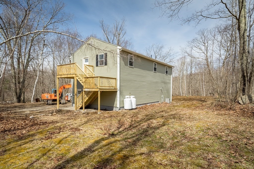 87 McBride Road Wales, MA 01081 - Photo 30 of 36 a view of a house with a snow