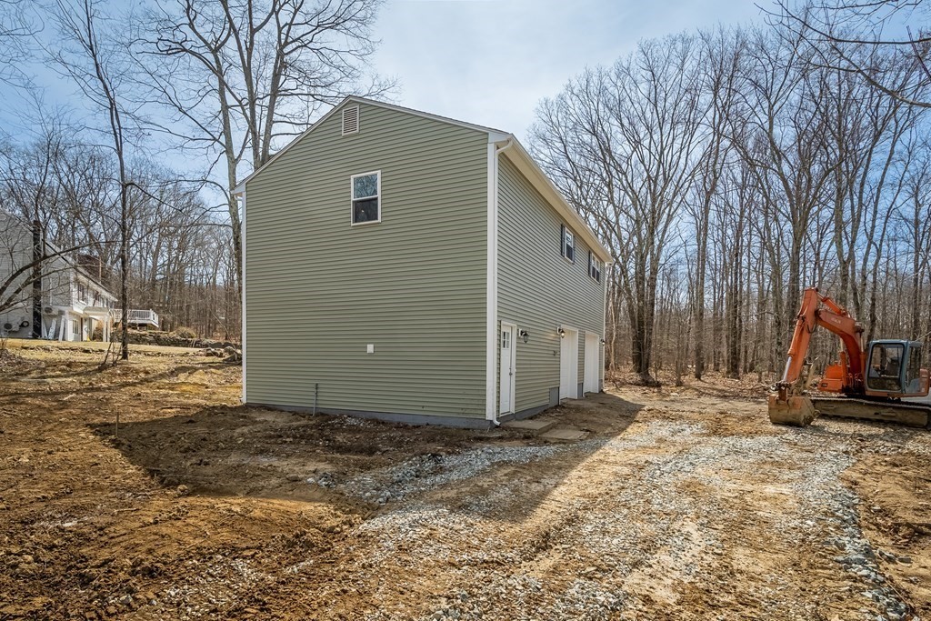 87 McBride Road Wales, MA 01081 - Photo 34 of 36 a backyard of a house
