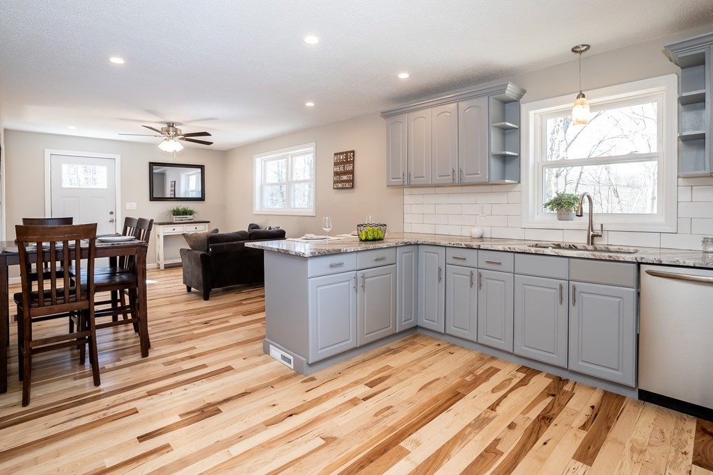 87 McBride Road Wales, MA 01081 - Photo 5 of 36 a kitchen with lots of counter top space and dining table