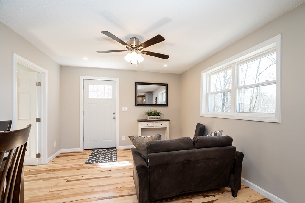 87 McBride Road Wales, MA 01081 - Photo 8 of 36 a living room with furniture and a window