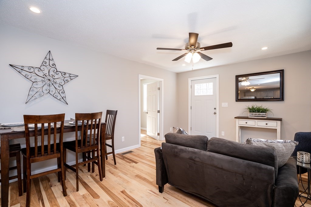 87 McBride Road Wales, MA 01081 - Photo 9 of 36 a living room with furniture a ceiling fan and a rug