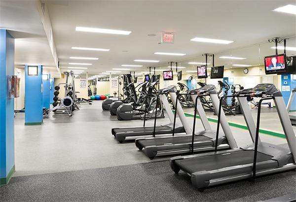 20 Chapel Street, Unit A308 Brookline, MA 02446 - Photo 4 of 5 a view of a room with gym equipment