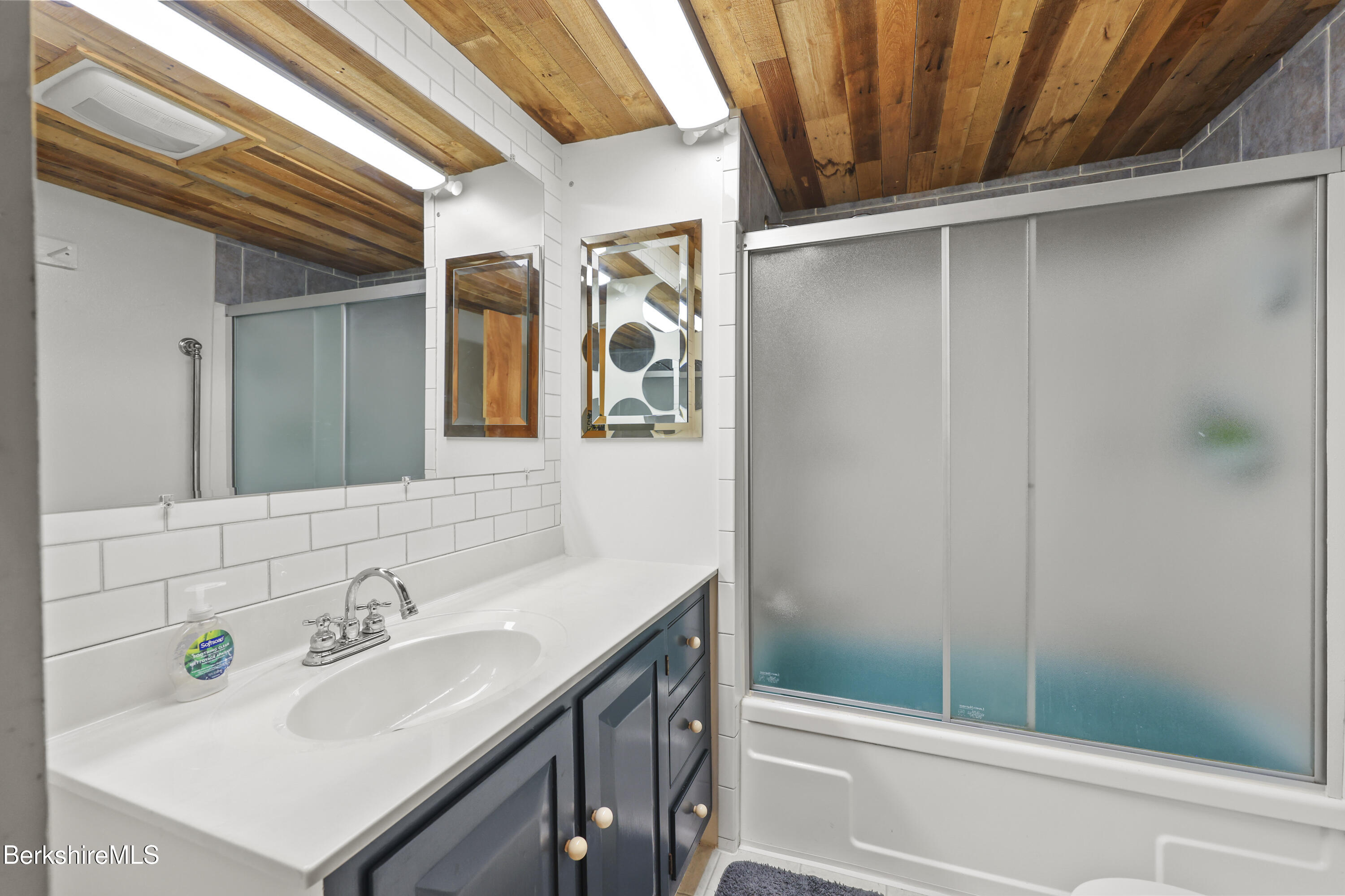 192 Curran Road Cheshire, MA 01225 - Photo 30 of 50 a bathroom with a sink a toilet and shower