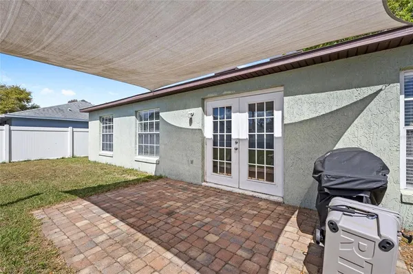a view of backyard of a house