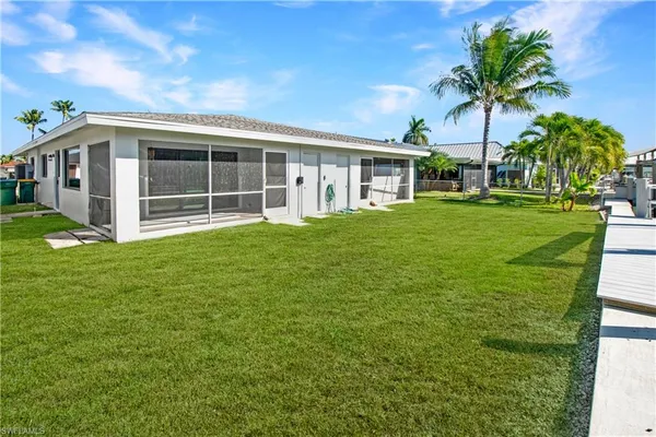 a house view with a garden space
