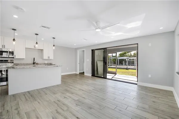 a view of an empty room and window