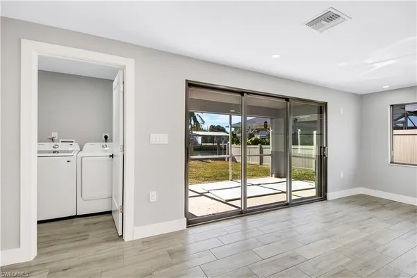 a view of an empty room and window