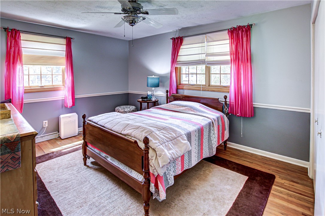 910 Andrews Road Medina, OH 44256 - Photo 31 of 45 Bedroom featuring ceiling fan and hardwood / wood-style floors