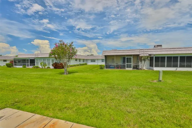 a view of a house with a garden