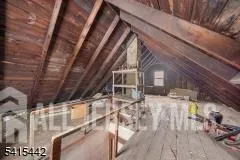 a view of a living room with furniture