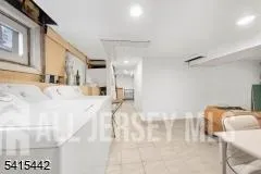 a view of a chairs and table in a room