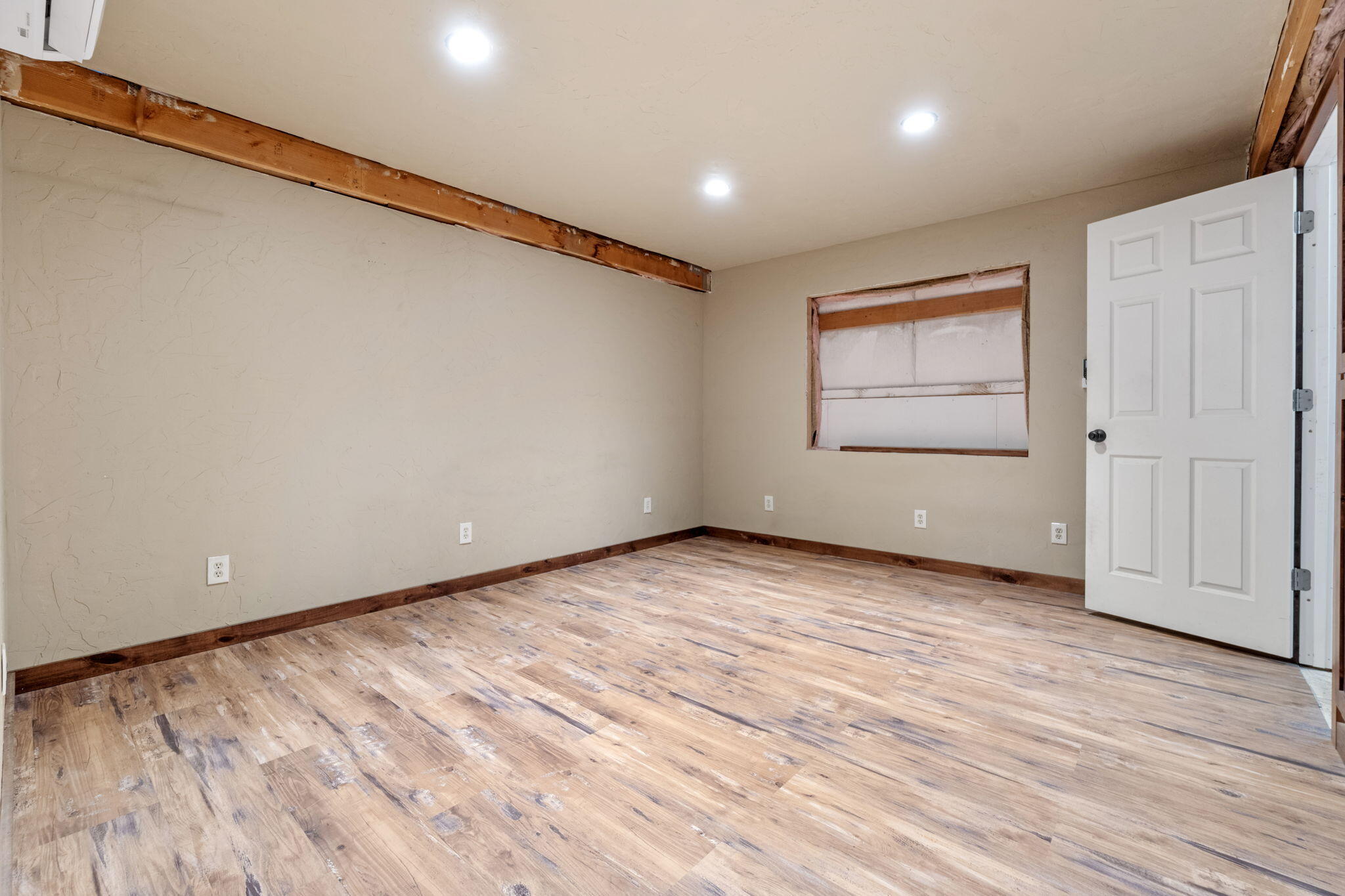 2630 Frontage Road Klamath Falls, OR 97601 - Photo 70 of 72 an empty room with wooden floor and windows