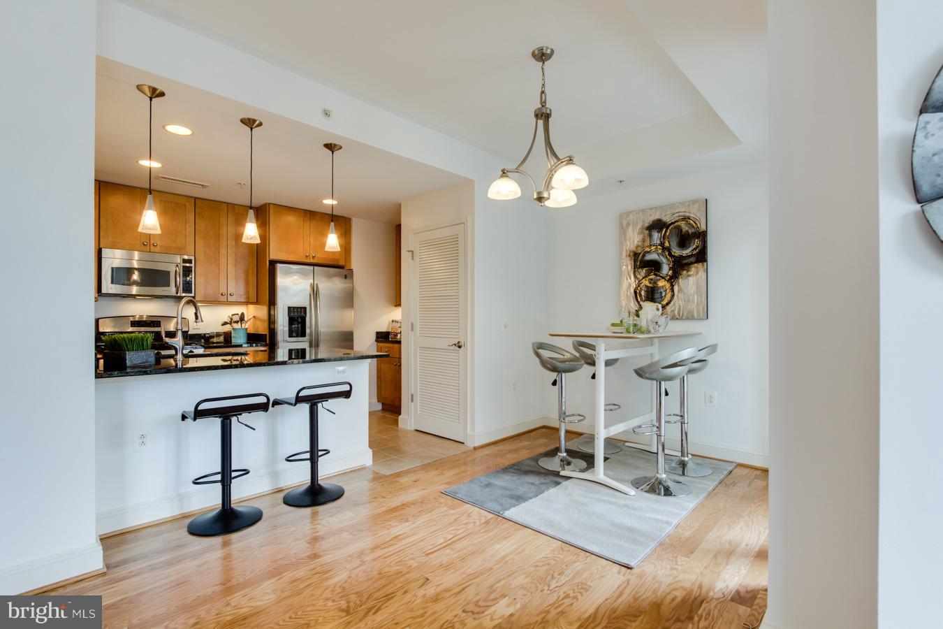 11990 Market Street, Unit 416 Reston, VA 20190 - Photo 12 of 29 Dining Rm Kitchen