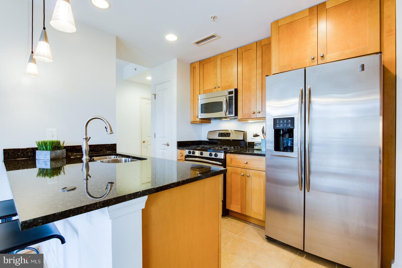 11990 Market Street, Unit 416 Reston, VA 20190 - Photo 14 of 29 Kitchen
