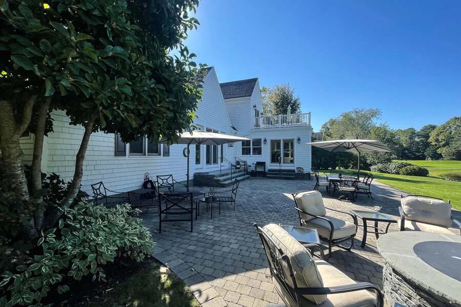 310 Willowbend Drive Mashpee, MA 02649 - Photo 12 of 37 a view of a house with backyard and sitting area