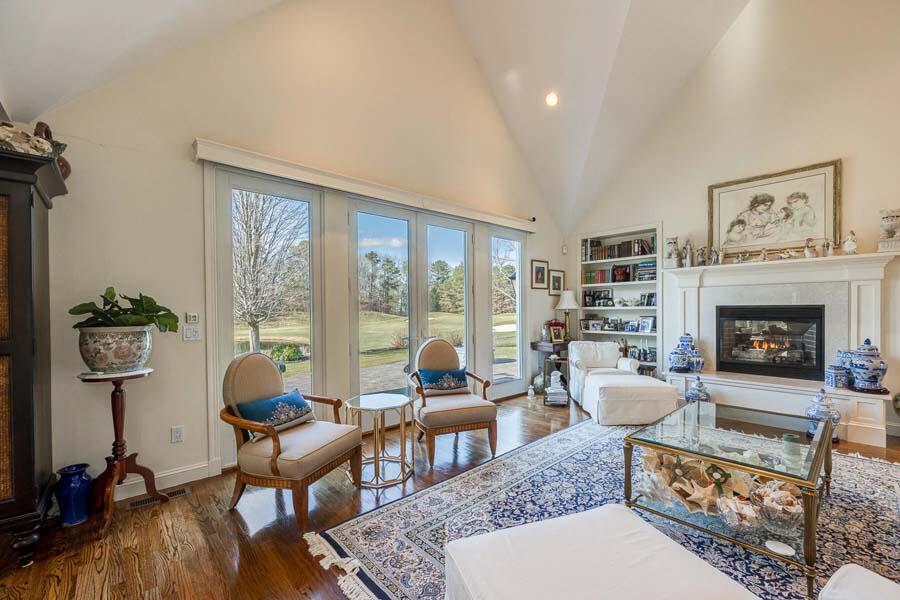 310 Willowbend Drive Mashpee, MA 02649 - Photo 15 of 37 a living room with furniture and a fireplace