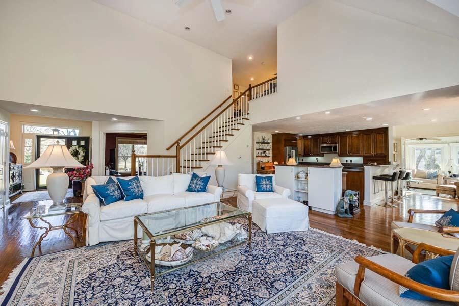 310 Willowbend Drive Mashpee, MA 02649 - Photo 17 of 37 a living room with furniture couches and kitchen view