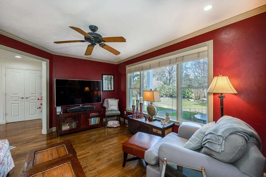 310 Willowbend Drive Mashpee, MA 02649 - Photo 24 of 37 a living room with furniture and a flat screen tv
