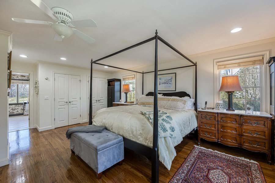 310 Willowbend Drive Mashpee, MA 02649 - Photo 26 of 37 a spacious bedroom with a bed window and a dresser