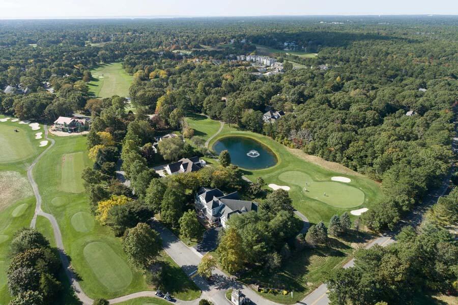 310 Willowbend Drive Mashpee, MA 02649 - Photo 3 of 37 an aerial view of a houses with a lake view