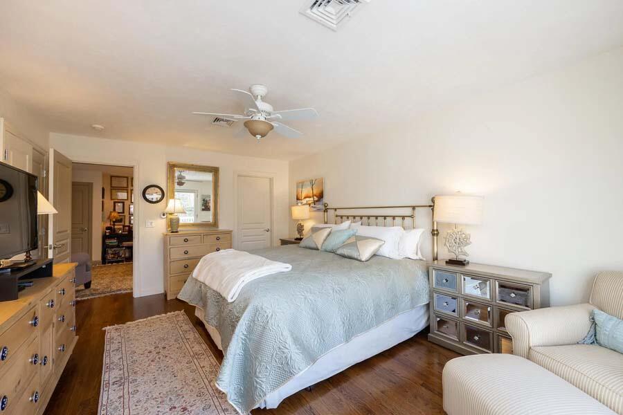 310 Willowbend Drive Mashpee, MA 02649 - Photo 34 of 37 a bedroom with a bed couch and a flat tv screen