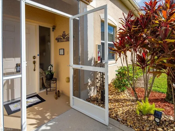 a view of a porch with furniture