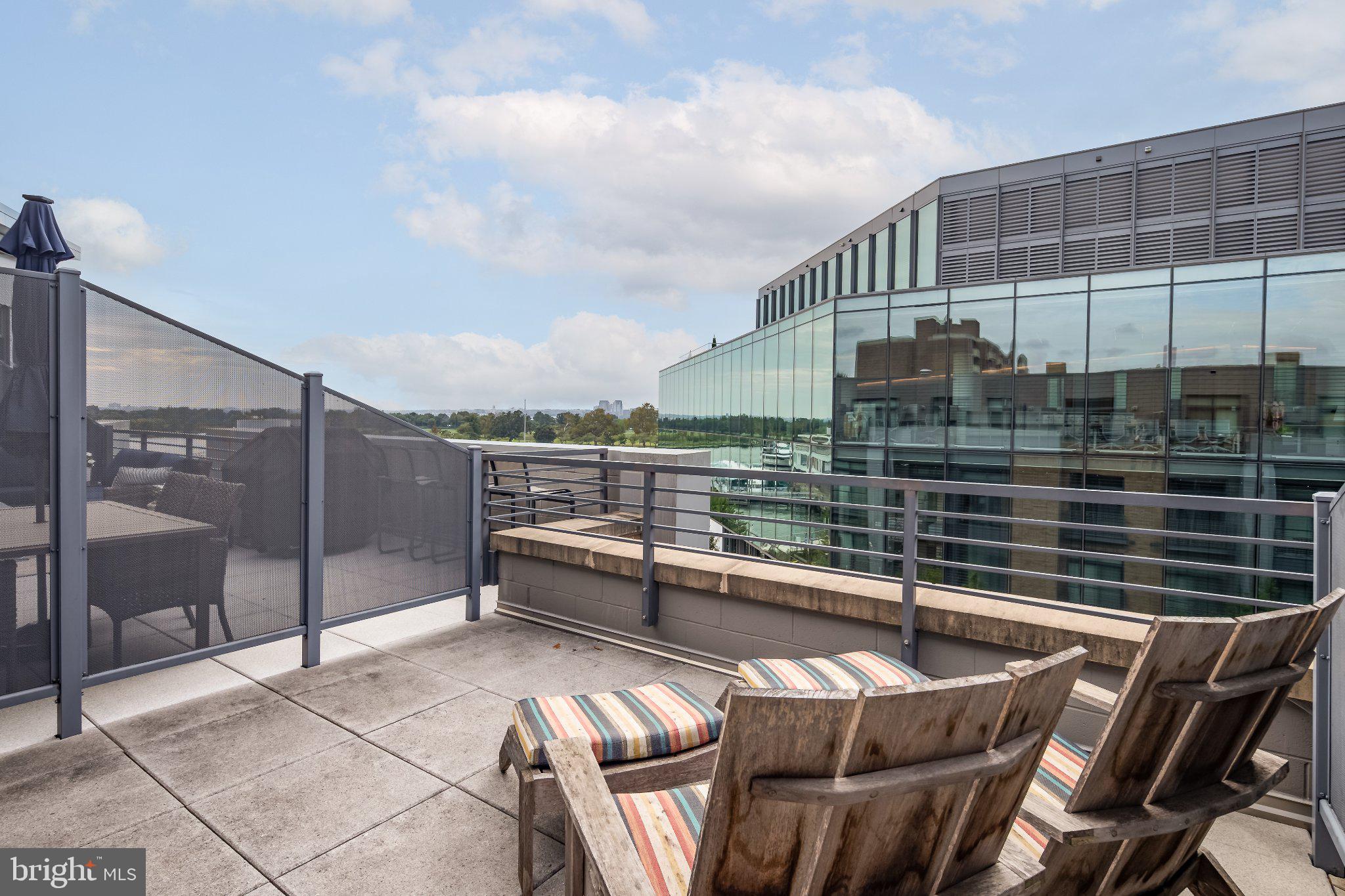 525 Southwest Water Street Southwest, Unit 404 Washington, DC 20024 - Photo 20 of 82 Urban rooftop retreat with skyline views.