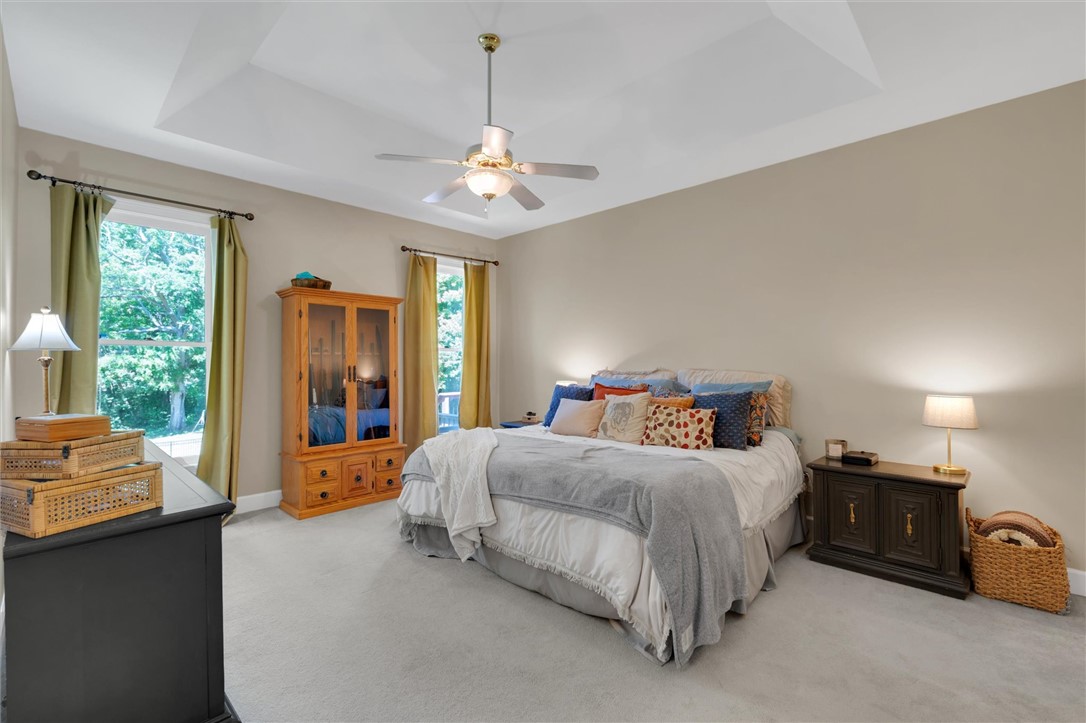 117 Winding Creek Road Anderson, SC 29621 - Photo 17 of 42 An inviting bedroom features ample natural light and a comforting atmosphere.