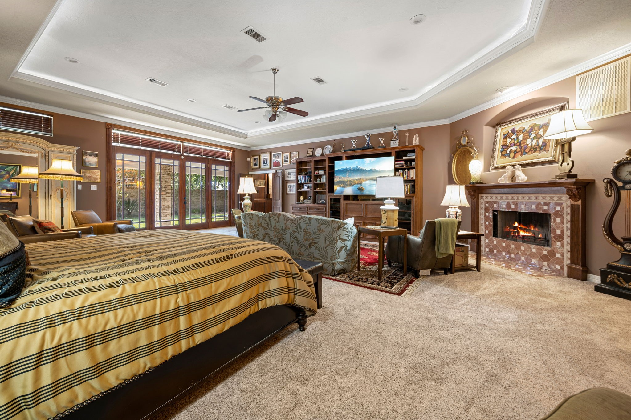 3519 Singleton Road Baytown, TX 77521 - Photo 24 of 46 a bed room with furniture and a fireplace