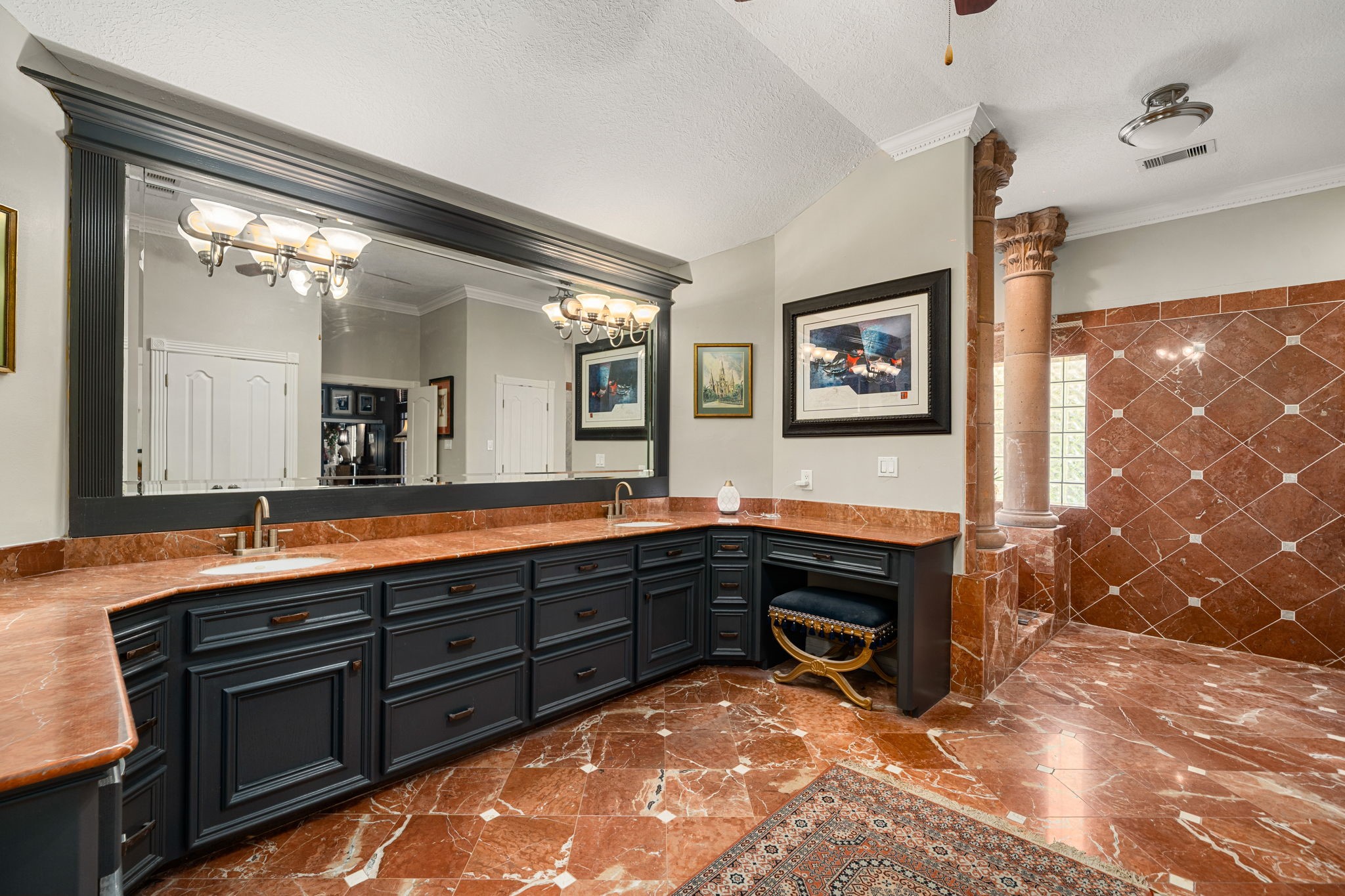 3519 Singleton Road Baytown, TX 77521 - Photo 25 of 46 a spacious bathroom with a sink and a large mirror