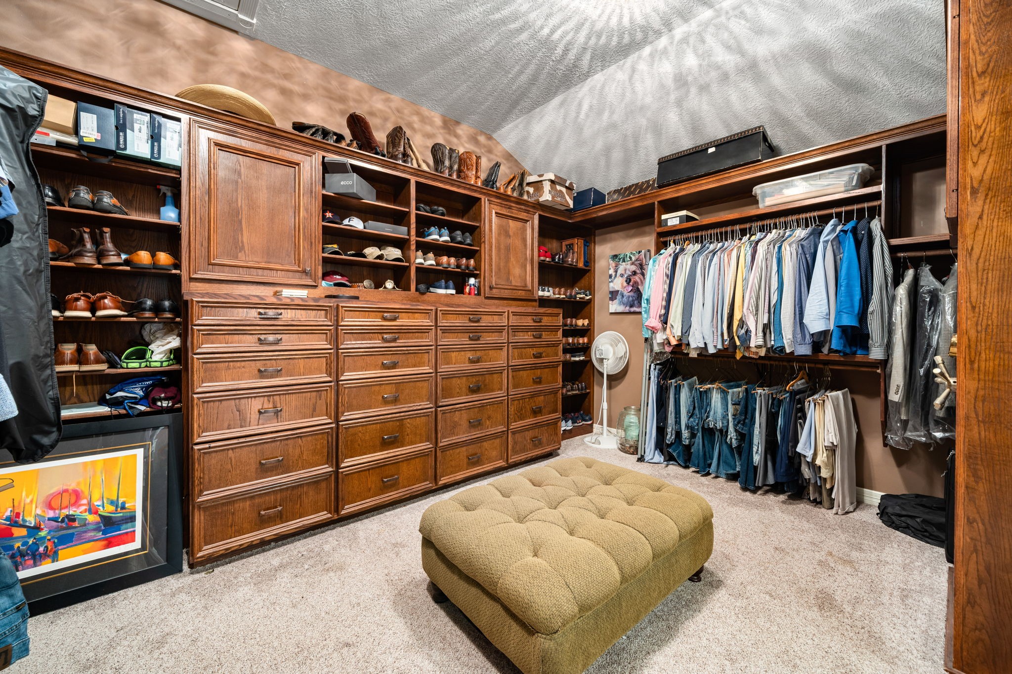 3519 Singleton Road Baytown, TX 77521 - Photo 28 of 46 a view of walk in closet with clothes and shoes