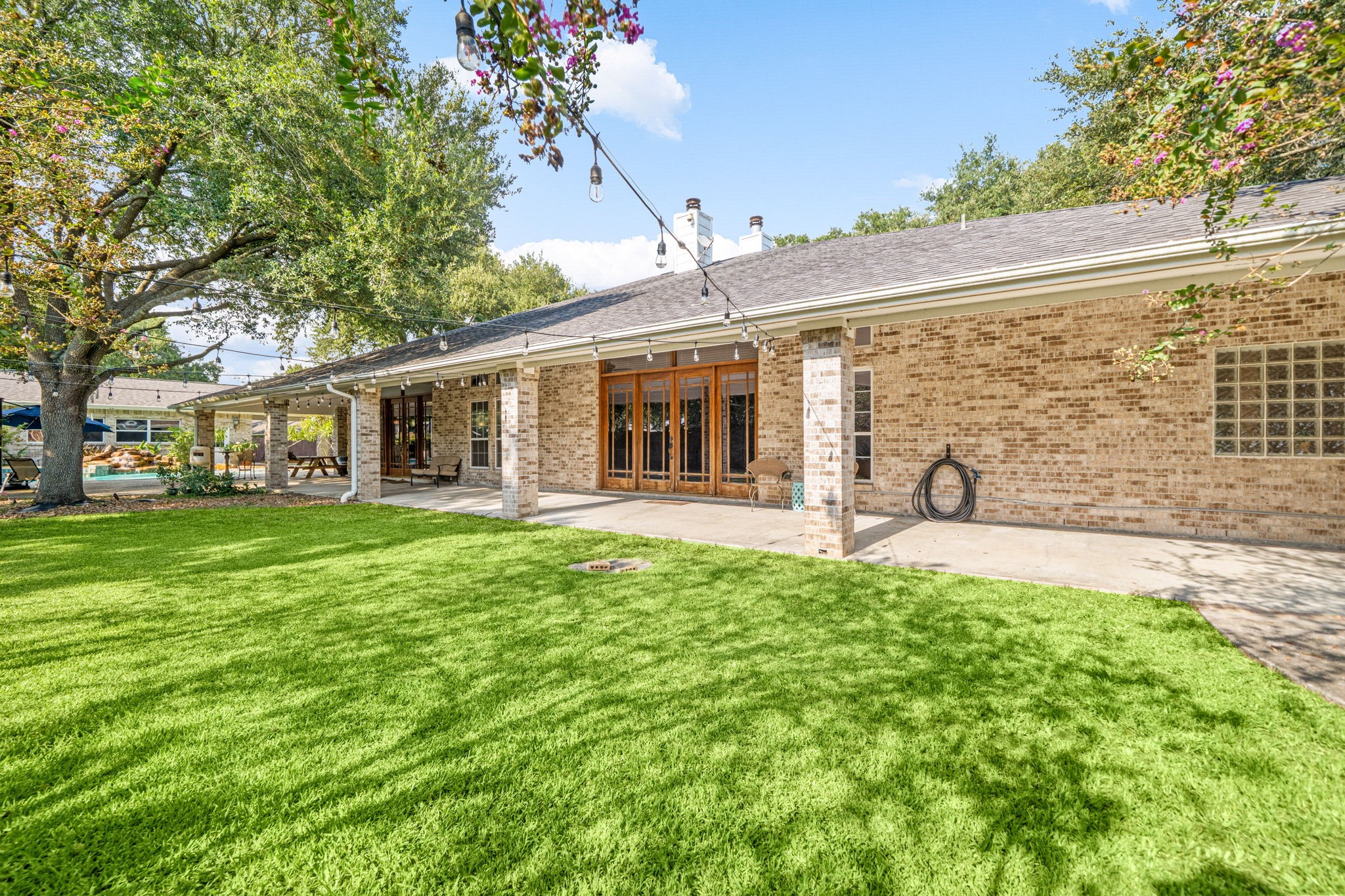3519 Singleton Road Baytown, TX 77521 - Photo 4 of 46 a front view of a house with a garden
