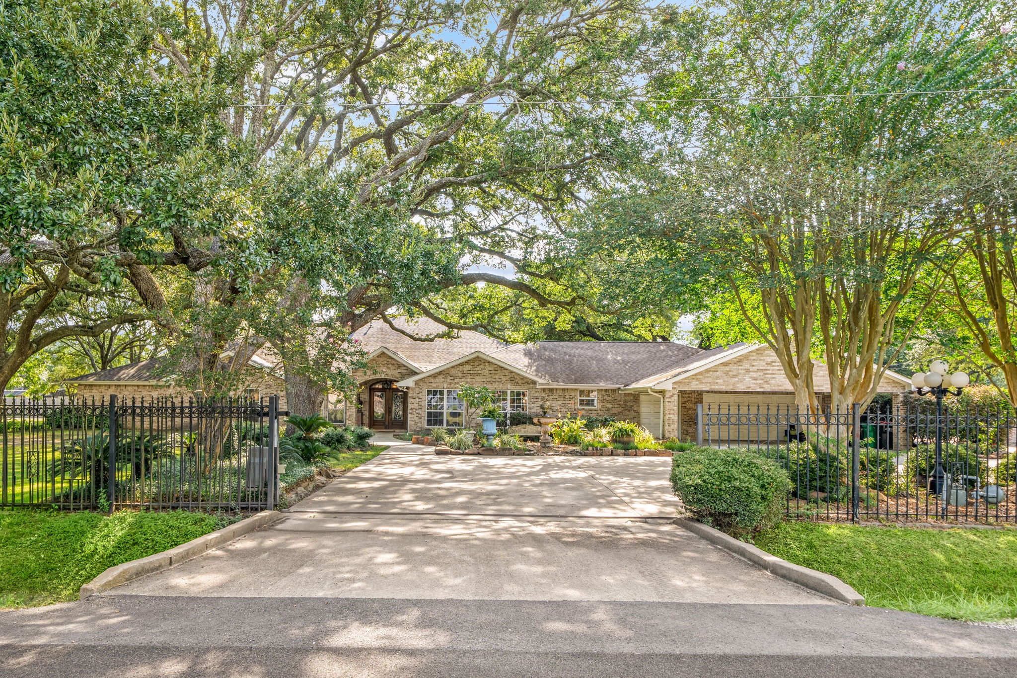 3519 Singleton Road Baytown, TX 77521 - Photo 6 of 46 a view of house with outdoor space and tree s