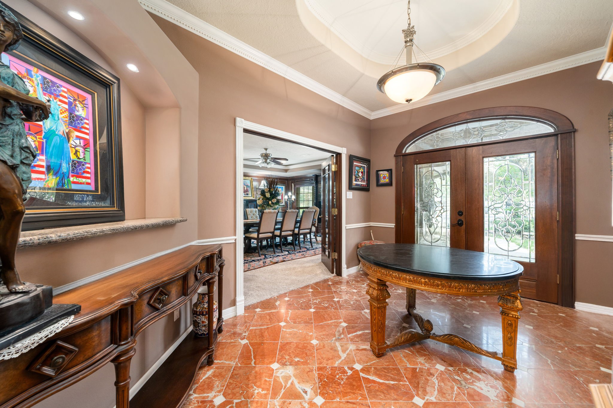 3519 Singleton Road Baytown, TX 77521 - Photo 9 of 46 a dining room with wooden floor and furniture