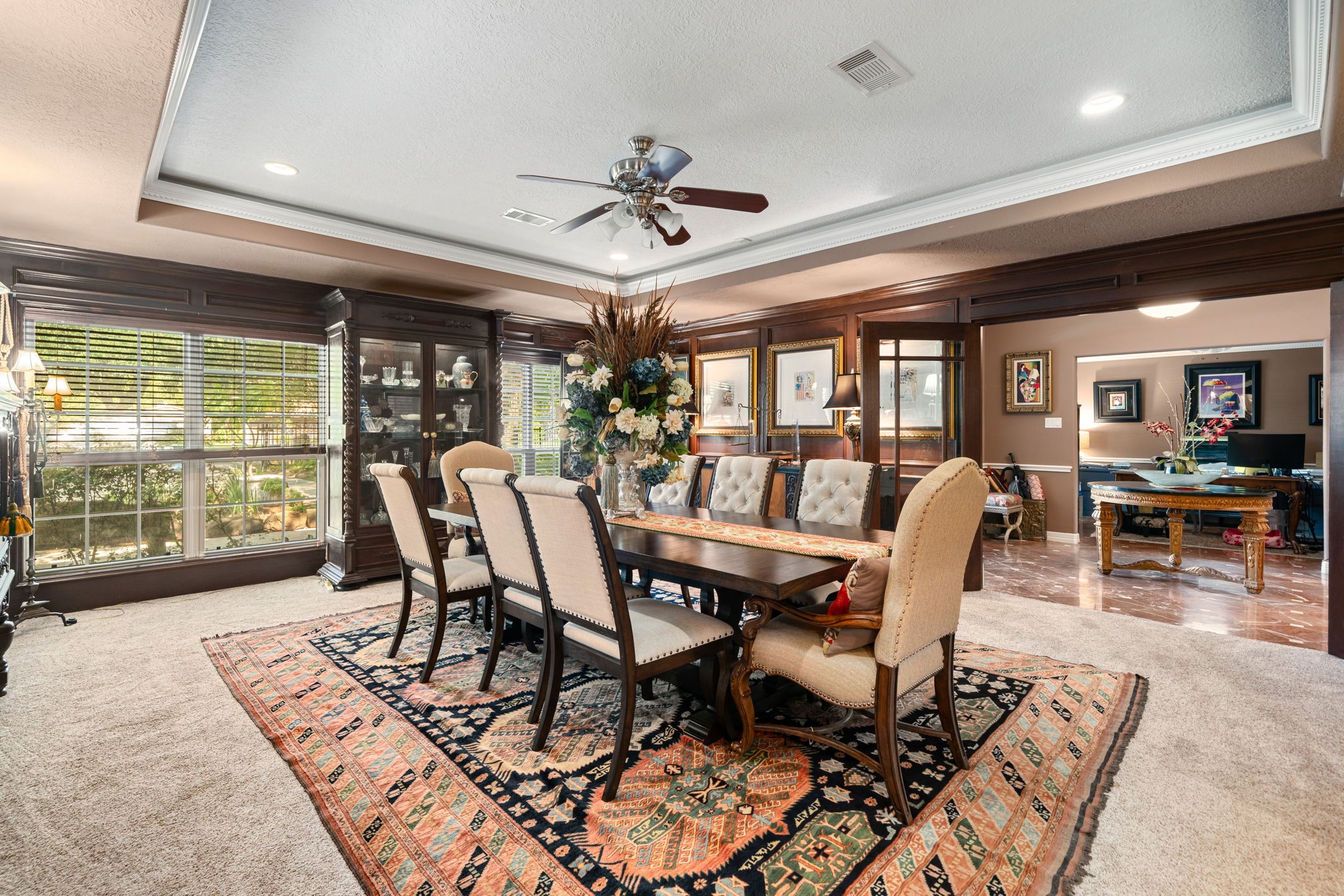 3519 Singleton Road Baytown, TX 77521 - Photo 10 of 46 a dining room with furniture a chandelier and wooden floor