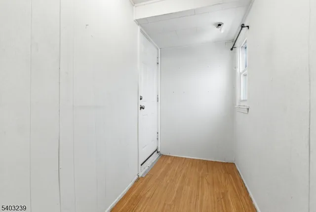 a kitchen with a stove a sink and a microwave