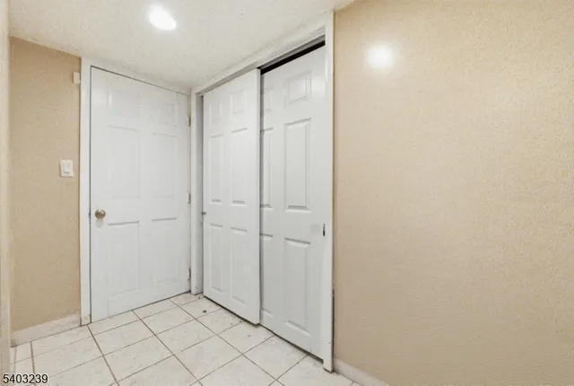 a view of a dinning table and chairs in the patio