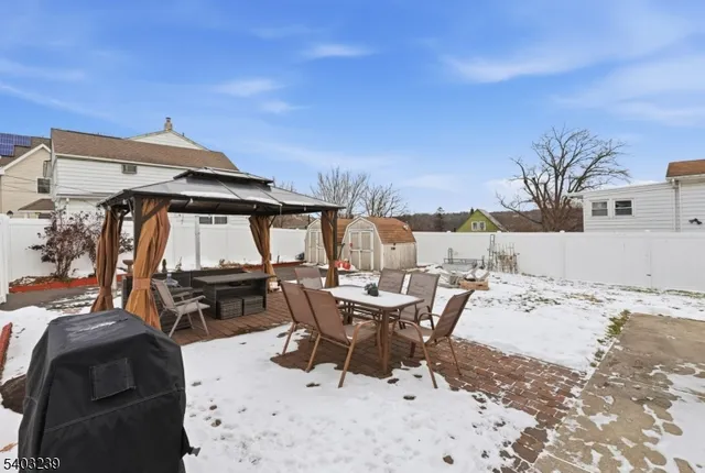 a view of a houses with a snow in the middle