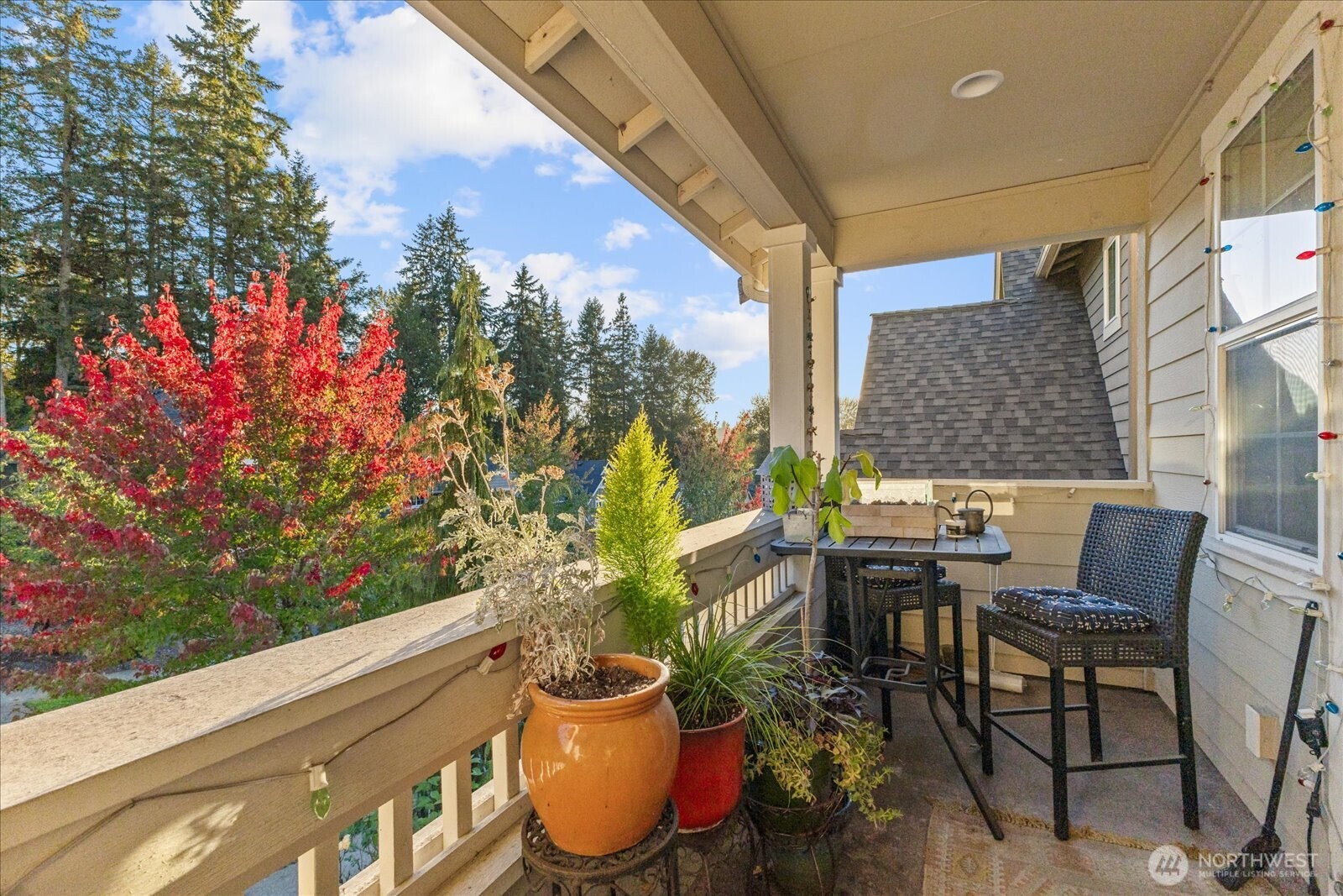 3611 232nd Street Southeast Bothell, WA 98021 - Photo 15 of 29 a view of a patio with table and chairs and potted plants