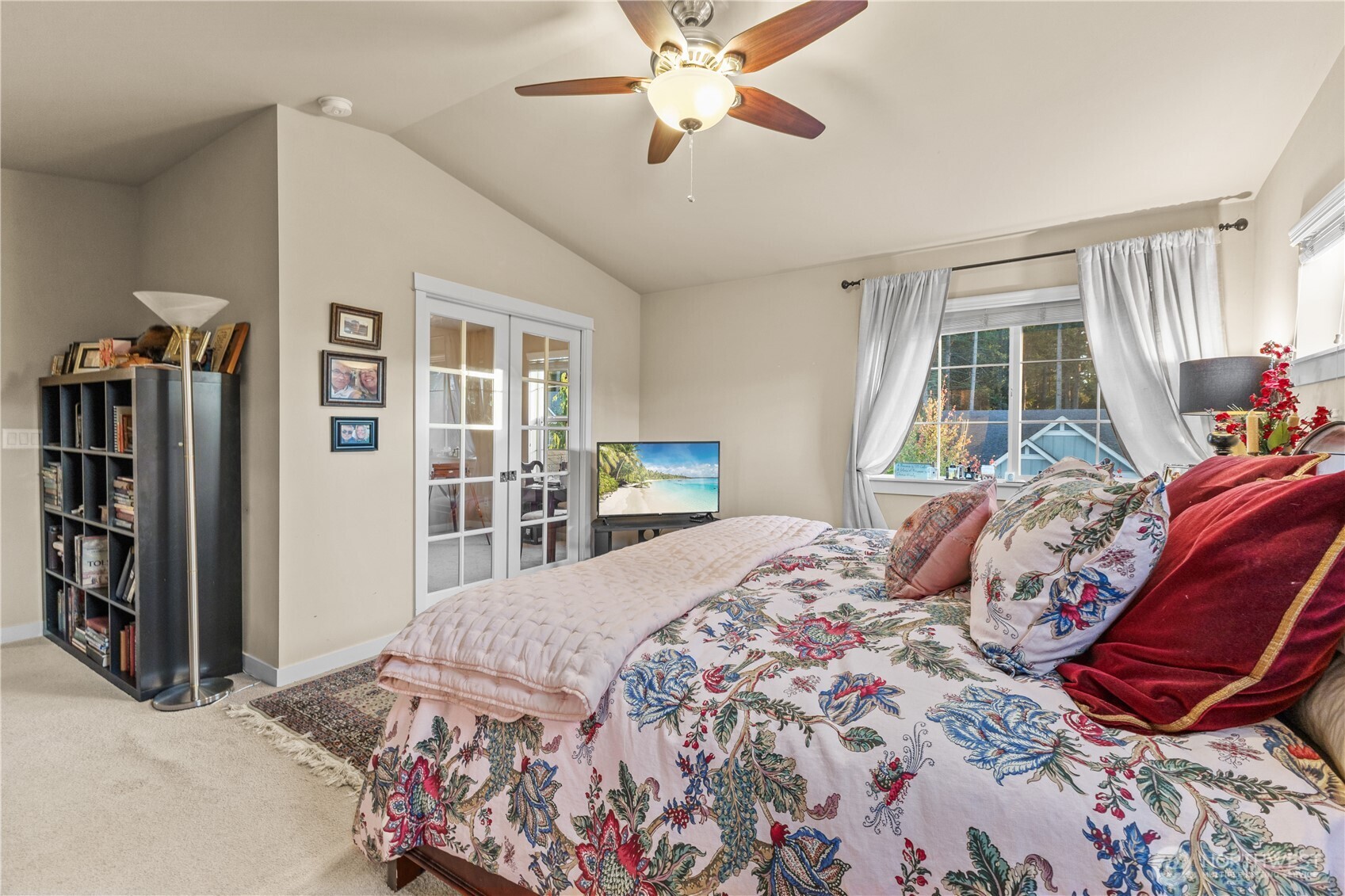 3611 232nd Street Southeast Bothell, WA 98021 - Photo 17 of 29 a bedroom with a large bed and a window
