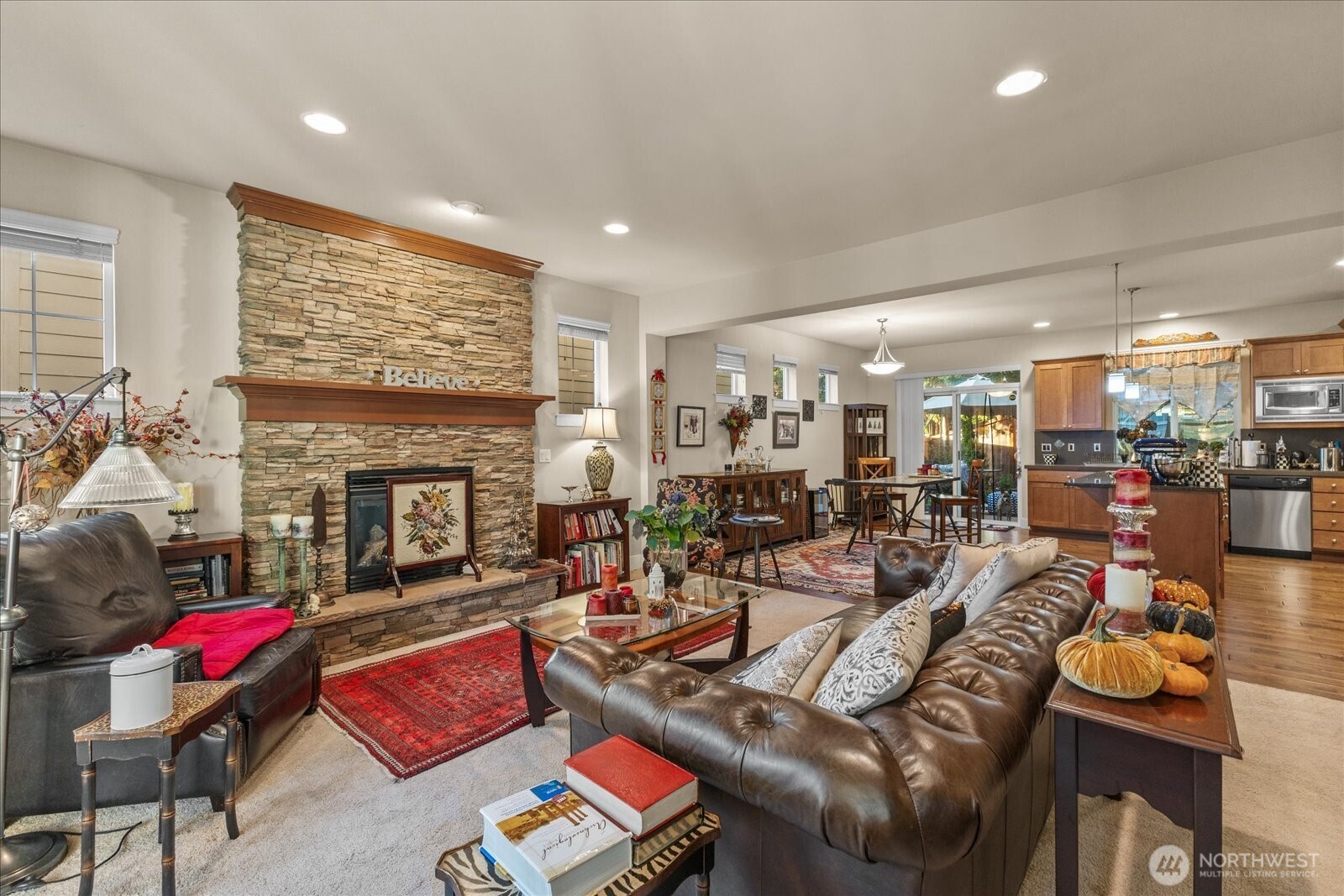 3611 232nd Street Southeast Bothell, WA 98021 - Photo 2 of 29 a living room with furniture and a fireplace