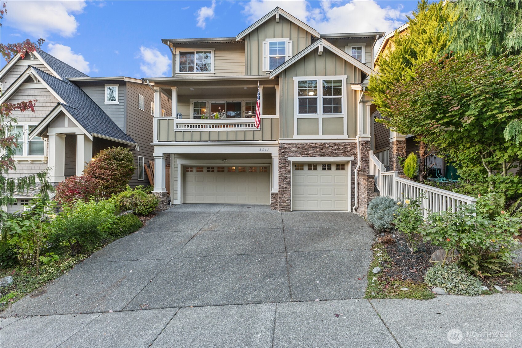 3611 232nd Street Southeast Bothell, WA 98021 - Photo 2 of 28 a front view of a house with a yard and garage