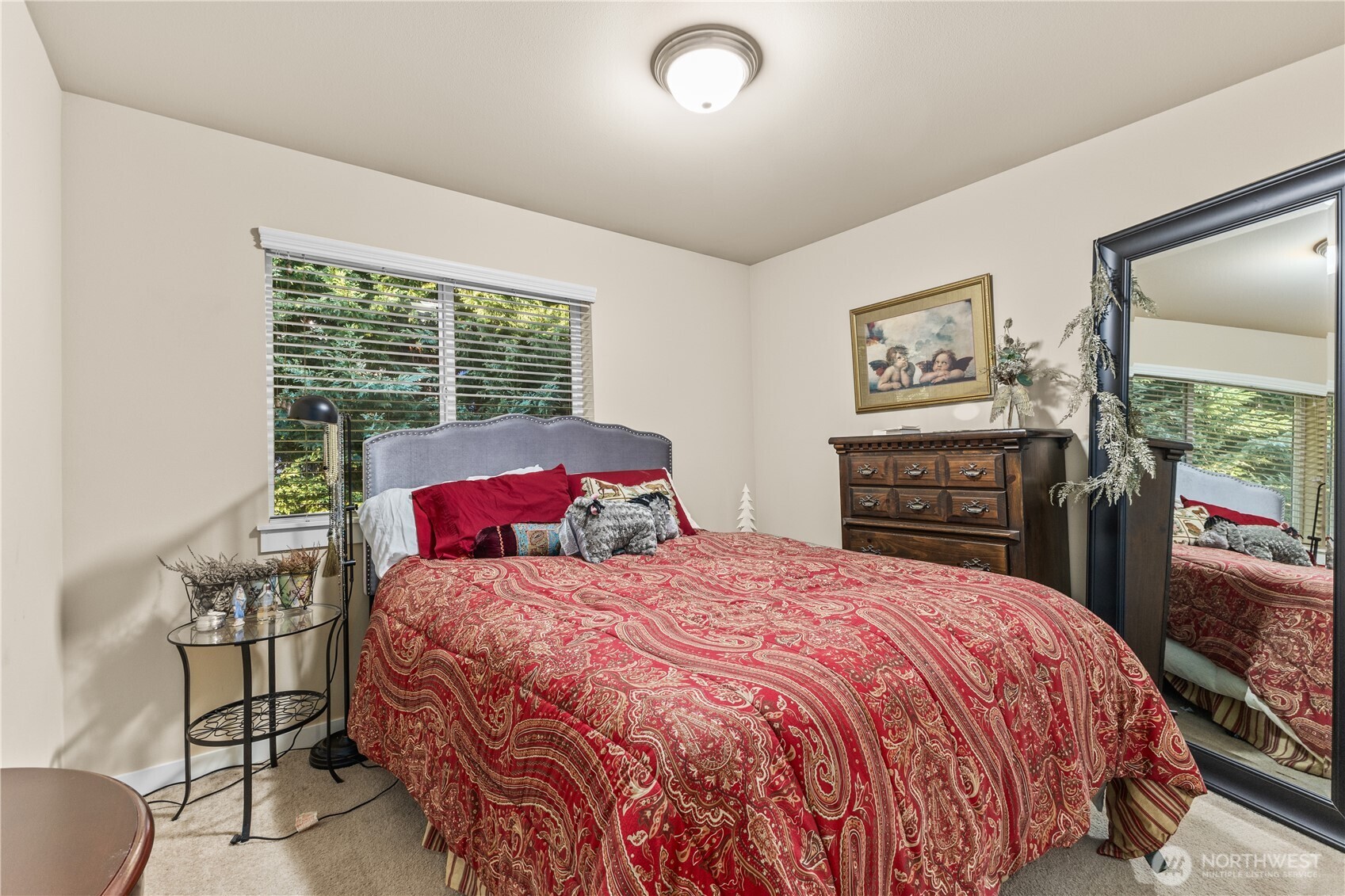 3611 232nd Street Southeast Bothell, WA 98021 - Photo 21 of 29 a bedroom with a bed and a flat screen tv