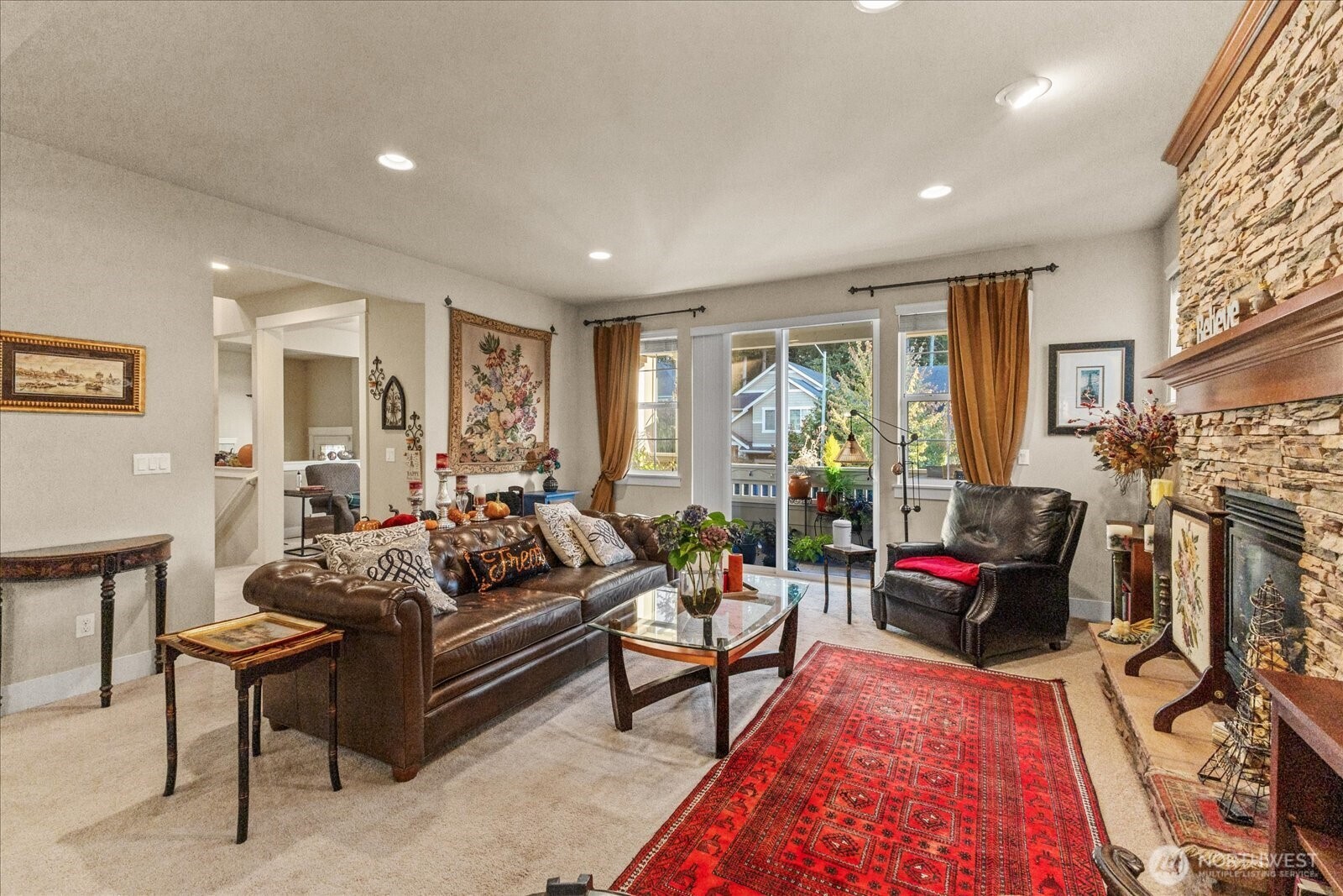 3611 232nd Street Southeast Bothell, WA 98021 - Photo 5 of 28 a living room with furniture fireplace and a window
