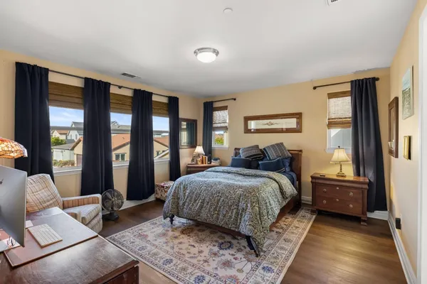 a bed room with a bed and a couch