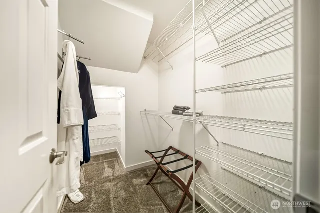 a view of small space with wooden floor and chair